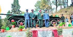 Director General of Military Operations, Lt Gen Vinod Bhatia, stands beside the T-55 Tank inaugurated at the Sainik School, Ghorakhal, on Wednesday.