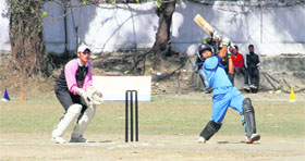 A batsman plays a shot in a match in the Girish Bhadri Memorial Cricket Tournament played at Rangers College ground in Dehradun on Wednesday.