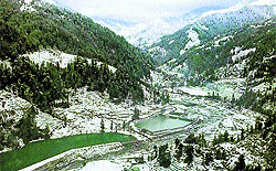 A view of the famous tourist spot Barot after fresh snowfall in Mandi on Wednesday