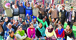 Employees protest outside the General Post Office in Una on Wednesday