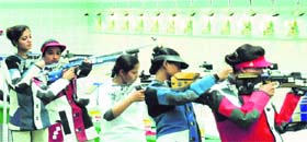 Shooters participate in the 10-metre air rifle event during the All-India Inter-University Shooting Championship being held at the Panjab University in Chandigarh on Thursday