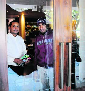 Miscreants broke the glass door at the Blue Blazer restaurant in Sector 26, Chandigarh, on Thursday
