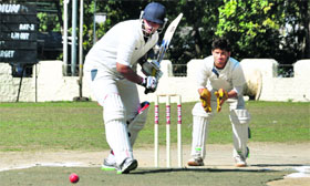 A batsman plays a shot in a match in the Dehradun District Premier League played at OFD Ground in Dehradun on Thrusday.