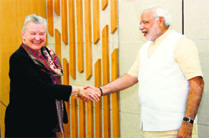 Gujarat Chief Minister Narendra Modi meets US Ambassador to India Nancy Powell in Gandhinagar on Thursday.