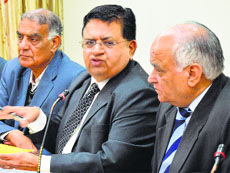 Members of the Punjab Tax Bar Association during a press conference in Ludhiana on Thursday.