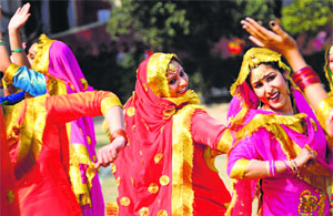 Girls perform giddha on the concluding day of the inter-school athletics meet held at the Guru Gobind Singh Khalsa College for Women in Ludhiana on Thursday.