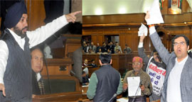BJP and Congress MLAs protest against the Jan Lokpal Bill during a special session of Delhi Vidhan Sabha on Friday.