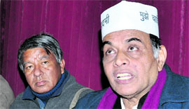 Spokesperson for the Aam Aadmi Party Anand Kumar addresses a press conference in Dehradun on Friday.