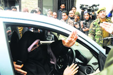 The police detain Dukhtaran-e-Millat chief Asiya Andrabi in Srinagar on Friday. Tribune Photo: Amin War