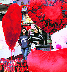 Girls ouside a gift shop on Valentine's Day in Jalandhar on Friday