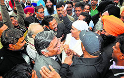 Residents of Dhobi Ghat gherao MLA Manoranjan Kalia and MLA Bibi Jagir Kaur in Jalandhar on Friday