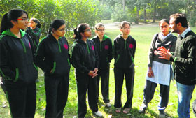 A member of the American Indian Foundation gives tips on film making to school students in Amritsar on Saturday.