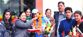 BBK DAV College for Women principal Neelam Kamra, felicitates Sneh Rana, international cricketer in Amritsar on Saturday.