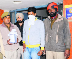 The accused, who was nabbed with Chinese pistol and cartridges, in Amritsar.
