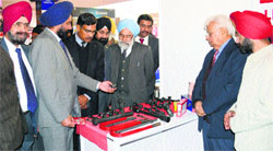 Office-bearers of the Micro, Small and Medium Enterprises Development Institute at the industrial exhibition in Ludhiana on Saturday. Photo: Inderjeet Verma