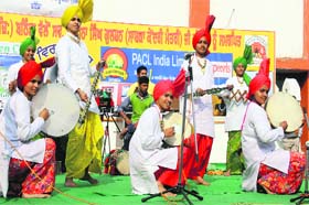 Students of Guru Gobind Singh Khalsa College, Jhar Saheb, perform a cultural item at the Virasat Mela in Bathinda on Sunday