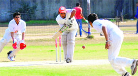 Players in action during a cricket match at Sector 8 in Chandigarh on Sunday.