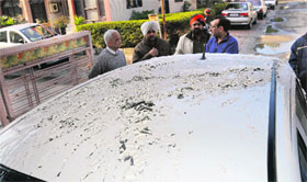 The car that was damaged at Phase VII in Mohali.