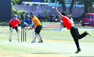 A match in progress during the Girish Bhadri Memorial Cricket Tournament played at the Rangers College Ground in Dehradun on Sunday