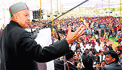 CM Virbhadra Singh addresses a public meeting at Dulehar village in Una district on Sunday