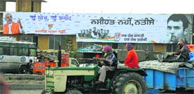 Even as the Lok Sabha elections are yet to be announced, hoardings of parties have started appearing in Jalandhar