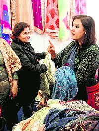 Women at a stall of Pakistani suits at the Indo-Pak expo in Ludhiana on Sunday