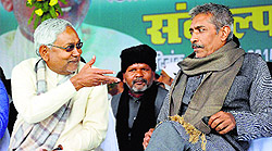 Bihar Chief Minister Nitish Kumar with filmmaker Prakash Jha at a rally in Patna on Sunday
