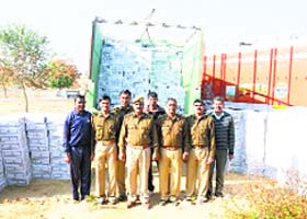 The police with the seized truck loaded with liquor on Sunday