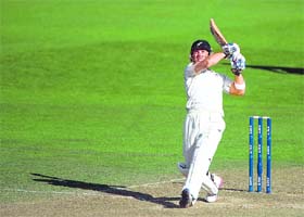Leading from the front: Brendon McCullum smashes a six off Ishant Shama to bring up his hundred, his second in the series, on Sunday to keep New Zealands hopes alive in the second Test at Wellington