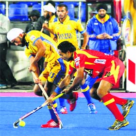 A match in progress between Punjab Warriors and Ranchi Rhinos in Mohali on Sunday