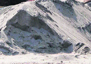 Heaps of sand dumped outside shops in defiance of norms in Amritsar.