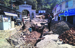 The road dug up for the laying of sewage pipes by the Peyjal Nigam at Barlowganj in Mussoorie. 