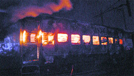 Fire engulfs a coach of Amritvani Express in Jalandhar on Sunday night.