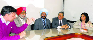 Delegates interact during a conference on Business Innovation Management at the GNIMT, Ludhiana.