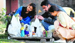 Students practice for the installation event in Ludhiana on Monday.
