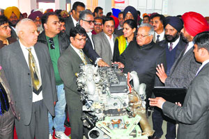 Cabinet Minister Madan Mohan Mittal with other officials during the launch of the Toyota Technical Education Programme at ITI, Gill Road, in Ludhiana on Monday.