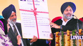 Deputy CM Sukhbir Singh Badal and Rural Development and Panchayats Minister Surjit Singh Rakhra release a Rahat certificate in Samana on Monday.