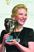 US actress Cate Blanchett poses with the award for a leading actress for her work on the film Blue Jasmine in London.