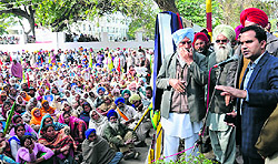 DC Kamal Kishore Yadav addresses the farmers during their dharna in Bathinda on Tuesday
