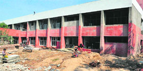 Construction work in progress for upgrading a poly clinic in Sector 45, Chandigarh, on Tuesday.