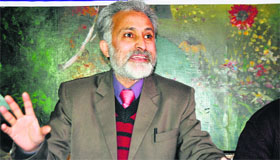 Chairman of the Coaching Centres Association, Kashmir, Ghulam Nabi Var addresses a press conference in Srinagar on Tuesday.
