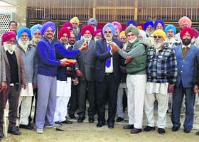 Members of the Indian Ex-servicemen League offer sweets to former MLA Gurdeep Singh Bhaini in Jagraon on Tuesday