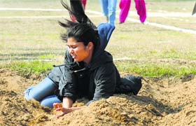 A girl takes part in long jump at the Satguru Ram Singh Government Polytechnic College for Women in Ludhiana on Tuesday