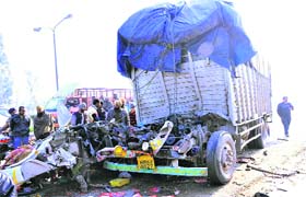 The mangled remains of the truck after it collided with a stationary goods carrier near Doraha on Tuesday