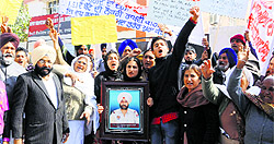 Simarjeet and family members protest in Amritsar on Tuesday