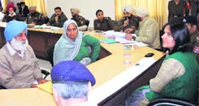 IG, NRI and Womens Wing, Gurpreet Deo, interacting with the aggrieved NRIs in Amritsar on Wednesday