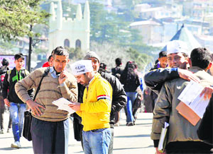 Aam Aadmi Party activists during a member registration drive in Shimla on Wednesday.