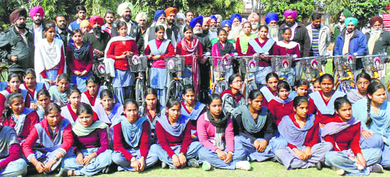 Punjab Vidhan Sabha Speaker Charanjit Singh Atwal with the beneficiaries of the Mai Bhago Scheme and students of Government Senior Secondary School, Doraha, on Wednesday.