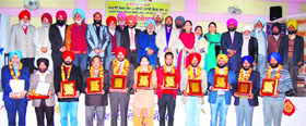 Teachers and literary scholars honoured for their achievements at an event organised by Janwadi Lekhak Sabha in Amritsar on Thursday.