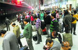 Harassed passengers wait for the Shatabdi at the Chandigarh railway station on Thursday evening. A Tribune photograph 